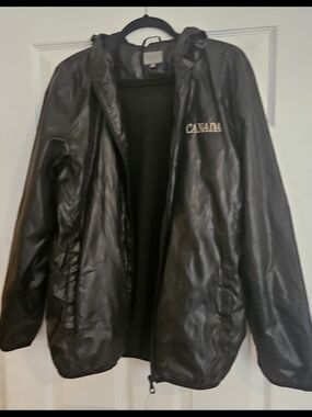 NWOT. Black Canada Hooded Wind breaker Lightweight Jacket. Size XL.